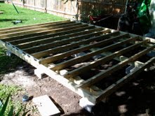 Building your shed floor on blocks.