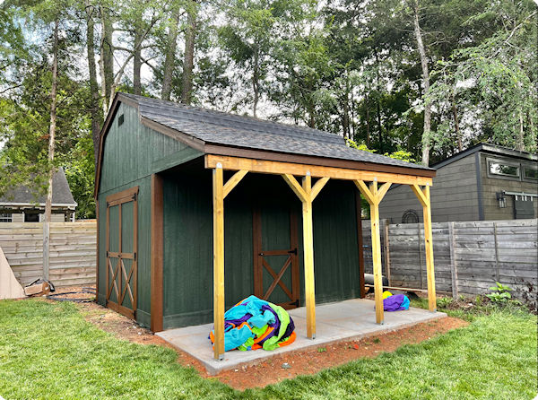 Here's Andy's 12x16 barn with porch picture. Here's Andy's 12x16 barn with porch picture.