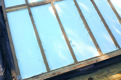 Picture of a shed floor with insulation. Picture of a shed floor with insulation.