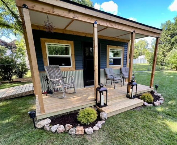 The front of Charlie's 12 x 16 barn with porch The front of Charlie's 12 x 16 barn with porch