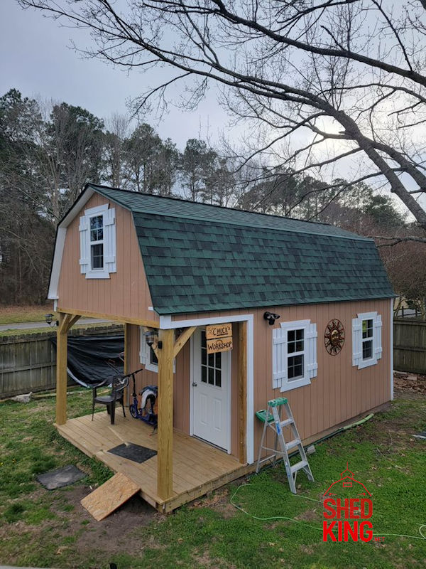 Here's Chuck's awesome 12'x22' barn style workshop shed. Chuck's beautiful 12'x22' barn shed with front porch.