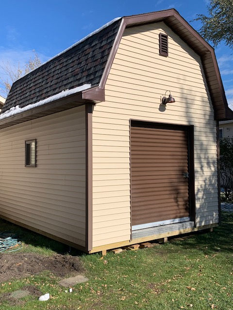Cory's built this fantastic 12x16 barn style shed with roll up shed door and huge loft. Cory's 12x16 barn shed with roll up door.