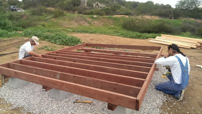 wooden shed floor on gravel