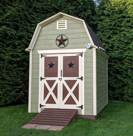 Jim used my 8x10 barn shed plans to build this neat backyard workshop.
