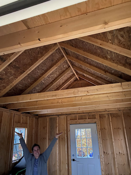 Kate showing off the huge loft for storage