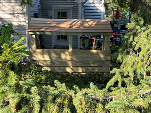 Back view of Matt's 2x8 firewood shed. Back view of Matt's 2x8 firewood shed.
