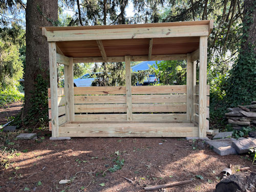 Matt's 2x8 firewood shed completed and looking great! Matt's 2x8 firewood shed completed and looking great!