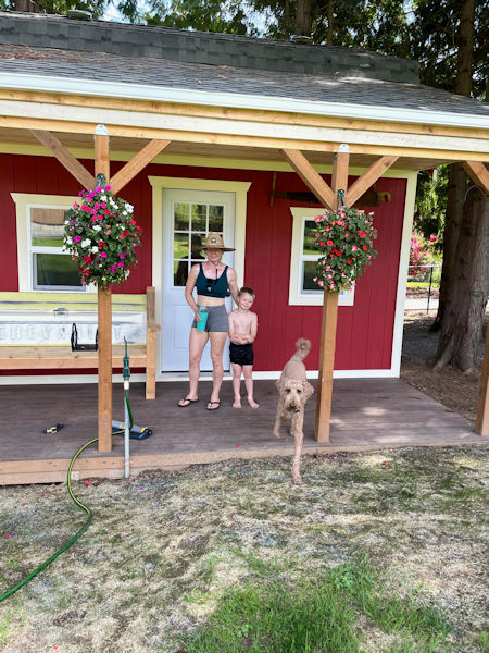 Shed picture of Paul's 12x22 barn shed with loft and porch. Paul's barns shed with porch and loft.