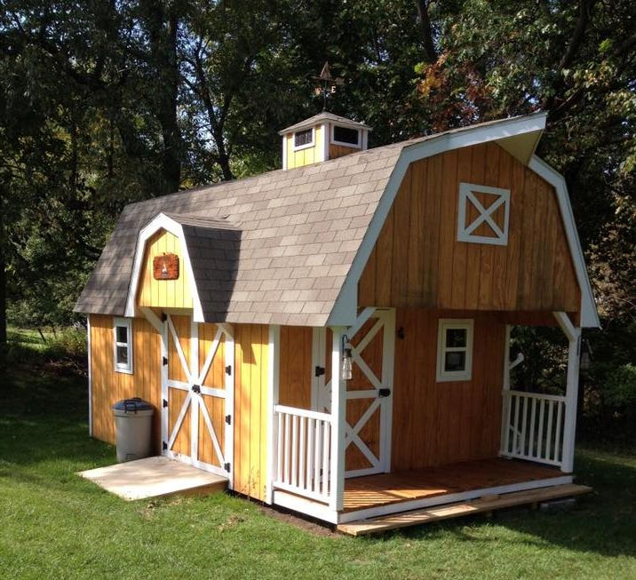 This yellow barn is a great shed house idea.