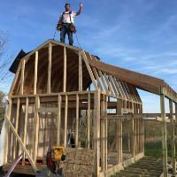 Pictures of Tim's off grid cabin Pictures of Tim Framing his shed with porch for off grid cabin.